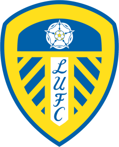 Leeds United Football Club crest: yellow shield with blue border and diagonal blue stripes, white central ribbon reading 'LUFC', and a blue rose at top.